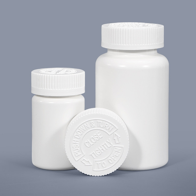カプセル錠剤のための彫刻された白い丸いプラスチック製の錠剤ボトル 医薬品保管
